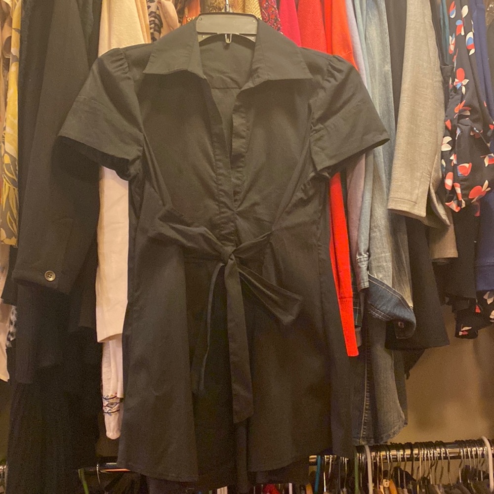 Black short sleeve blouse. Tie in front. Quality fabric.
